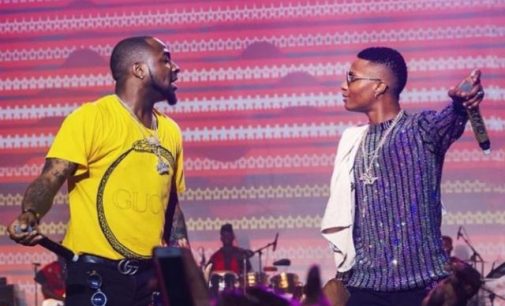 Davido, Wizkid hug out their differences at Lagos nightclub [VIDEO]